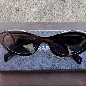 Prada Glossy Black Oval Sunglasses